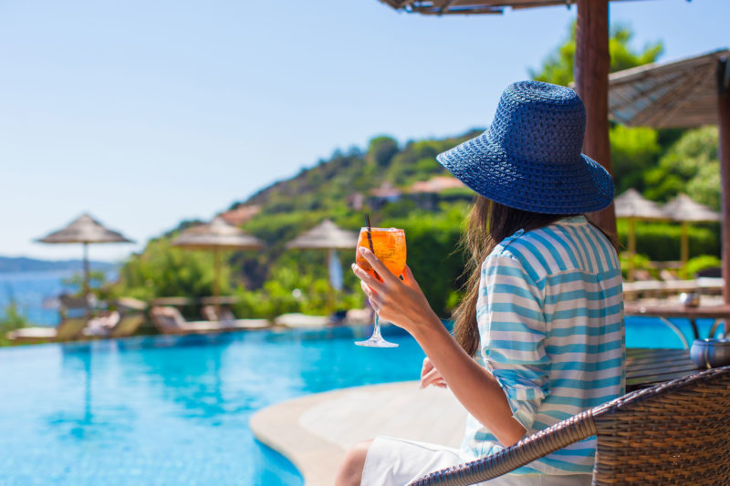 Summers Insurance view person at pool personal travel