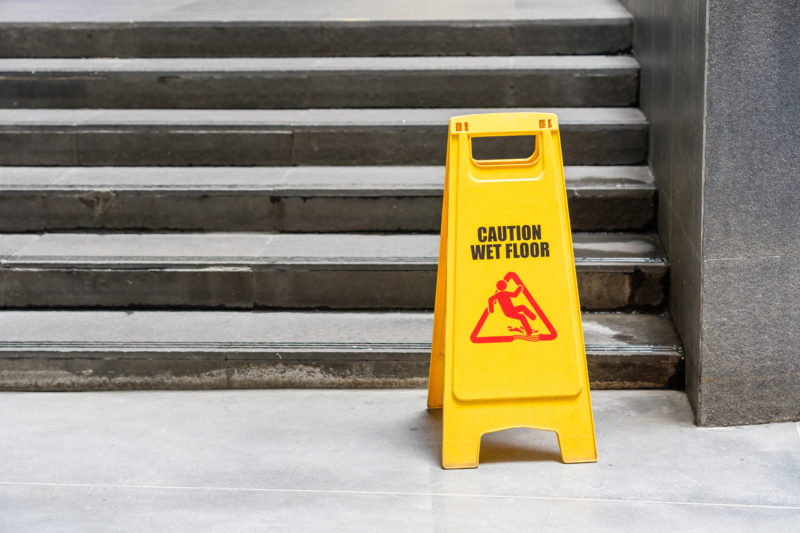 Summers Insurance Lobby floor hazard sign