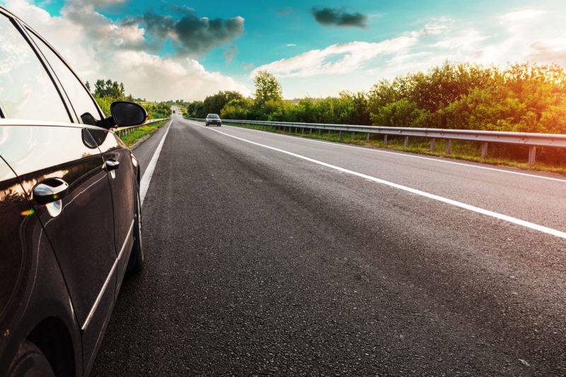 Summers Insurance car on road personal vehicle